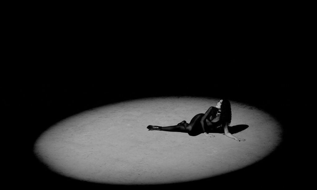 Kiana V on the music video for her single "Sweet Release."