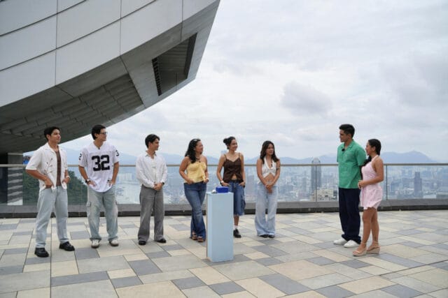 Daters with “Love on the Clock” hosts for “Love Locks” mission at The Peak
